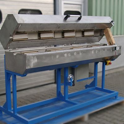Fours de transition avec table debout équipée de radiateurs infrarouges en acier inoxydable et d'une moitié supérieure à charnière pour chauffer des câbles en silicone de 9 mm