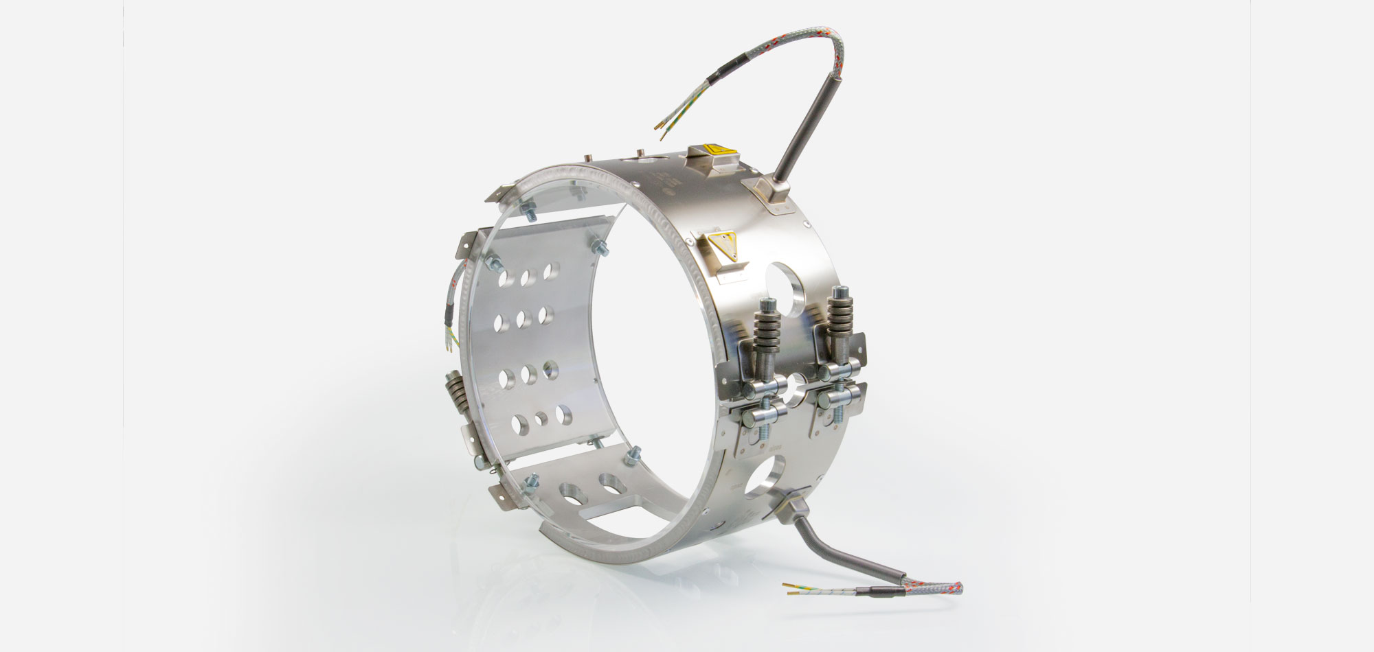 collier chauffant, pour températures jusqu'à 450 ° C, moulage par injection, extrusion, conception écoénergétique, flux thermique homogène, alésages, évidements, thermocouple intégré, système conforme au contour