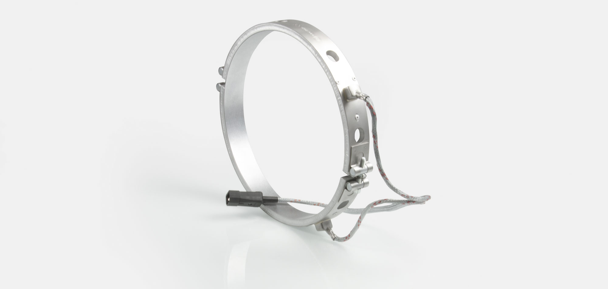 collier chauffant, pour températures jusqu'à 450 ° C, moulage par injection, extrusion, conception écoénergétique, flux thermique homogène, alésages, évidements, thermocouple intégré, système conforme au contour