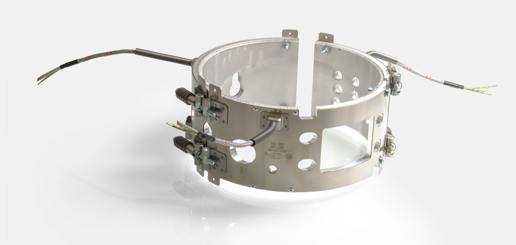 collier chauffant, pour températures jusqu'à 450 ° C, moulage par injection, extrusion, conception écoénergétique, flux thermique homogène, alésages, évidements, thermocouple intégré, système conforme au contour