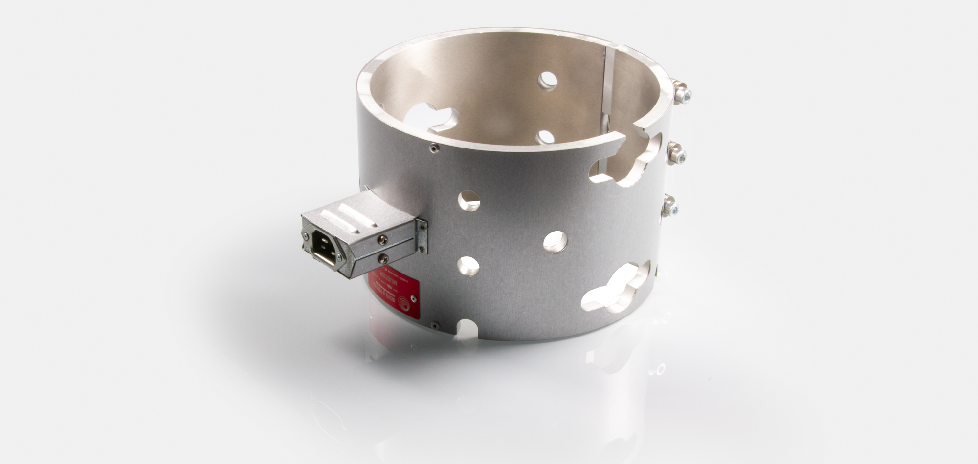 collier chauffant, pour températures jusqu'à 450 ° C, moulage par injection, extrusion, conception écoénergétique, flux thermique homogène, alésages, évidements, thermocouple intégré, système conforme au contour