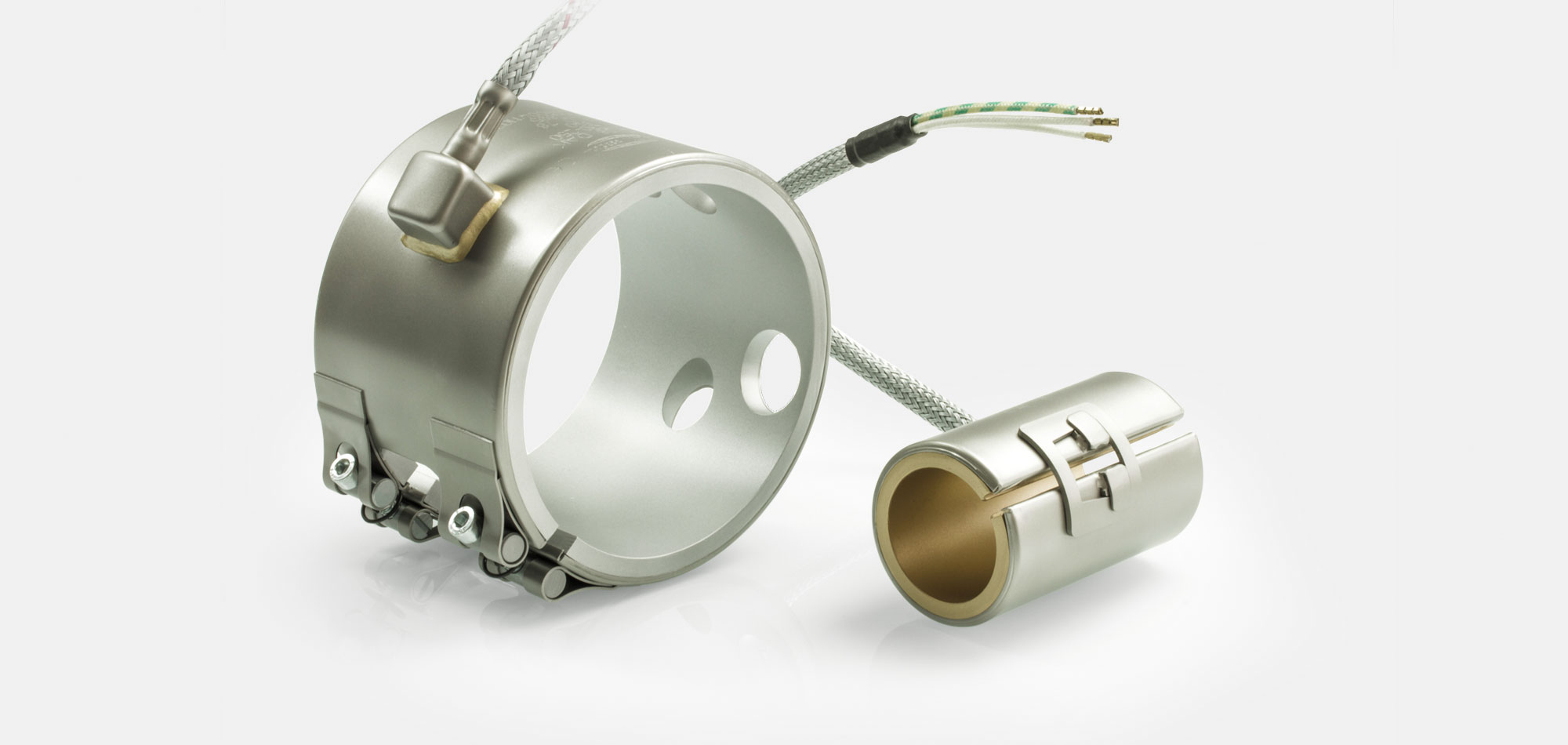 colliers de buse, pour températures jusqu'à 450°C/550°C, moulage par injection, conception écoénergétique, flux de chaleur homogène, trous, évidements, thermocouple intégré, contour spécial, Encombrement réduit, extrusion de câble
