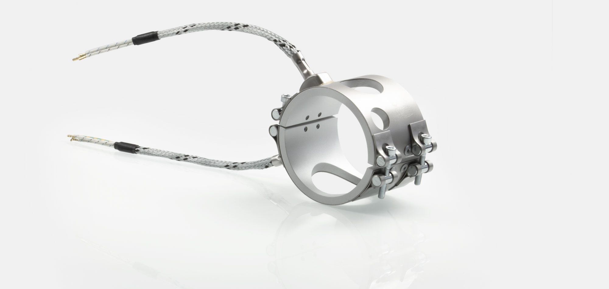 colliers de buse, pour températures jusqu'à 450°C/550°C, moulage par injection, conception écoénergétique, flux de chaleur homogène, trous, évidements, thermocouple intégré, contour spécial, Encombrement réduit, extrusion de câble