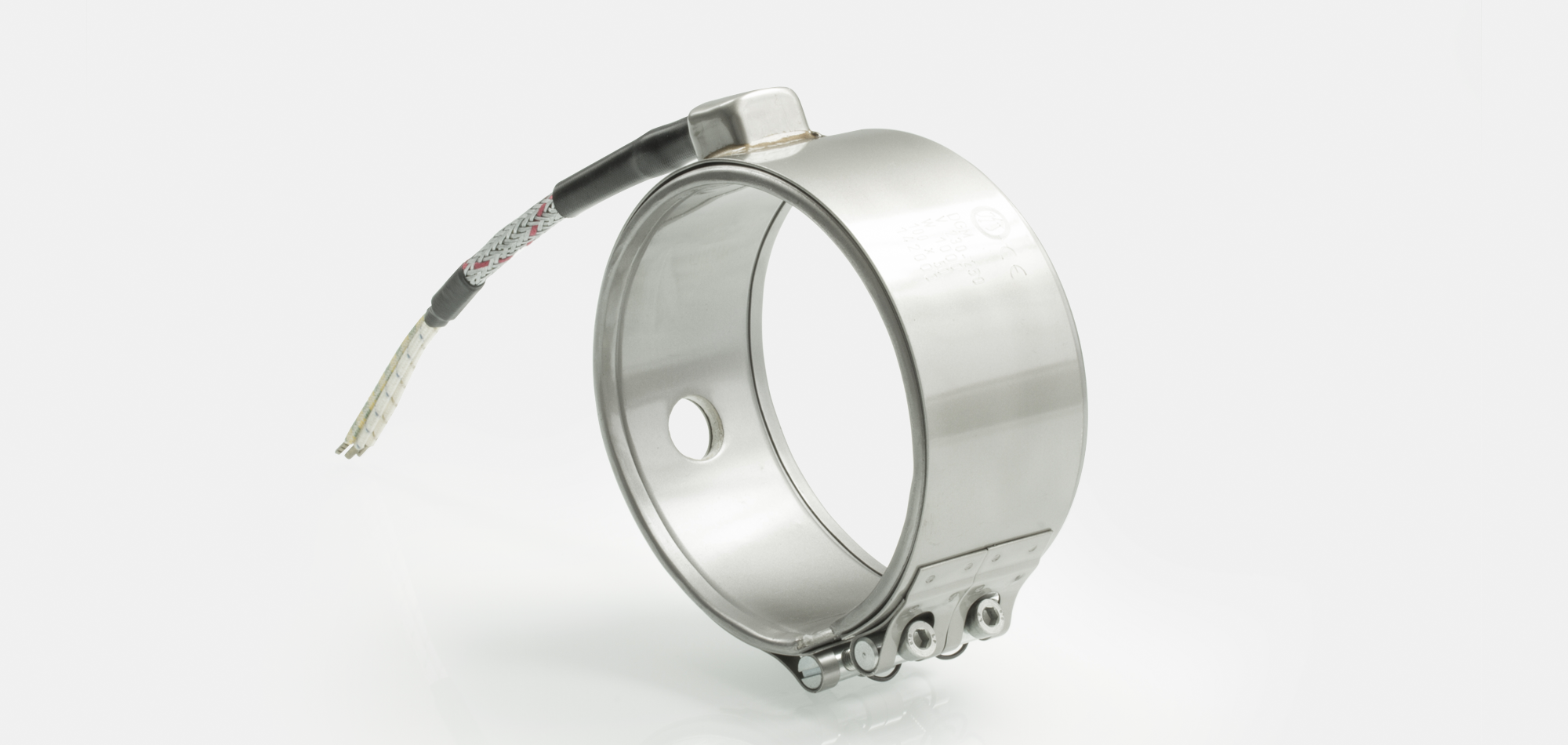 collier de buse „haute charge“, températures jusqu'à 600°C, moulage par injection, évidements, support thermocouple, thermocouple intégré, Encombrement réduit, matériaux exigeants, traitement PTFE-PEEK, temps de cycle réduits, extrusion de câble