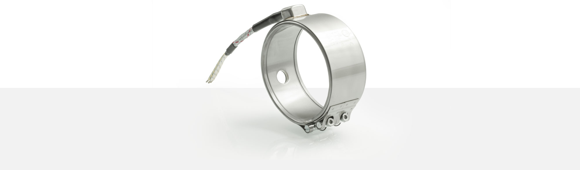 collier de buse „haute charge“, températures jusqu'à 600°C, moulage par injection, évidements, support thermocouple, thermocouple intégré, Encombrement réduit, matériaux exigeants, traitement PTFE-PEEK, temps de cycle réduits, extrusion de câble