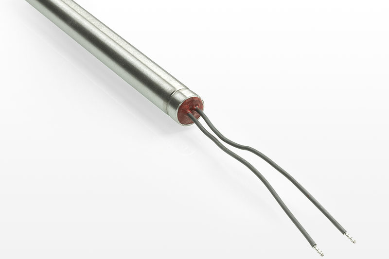 Exécution L: Tête sous silicone (protection contre l'humidité). température environ 200°C